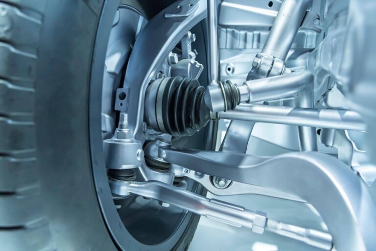 Close-up of a car suspension and wheel assembly.