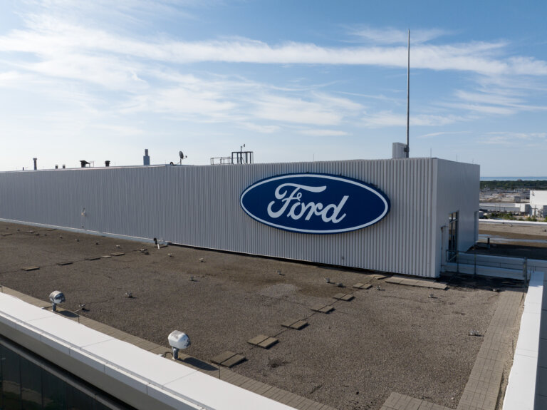 The Ford logo is seen atop their Canada headquarters office building.