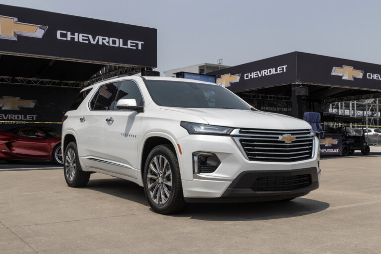 White Chevrolet Traverse SUV displayed at a Chevrolet event.