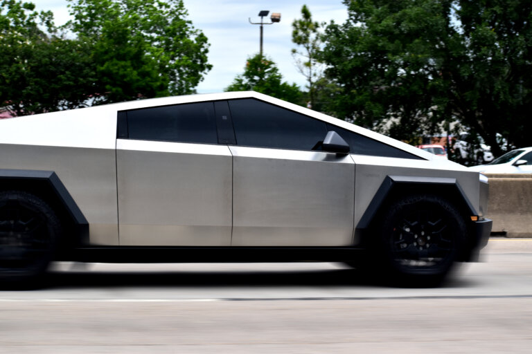 Tesla Cybertruck driving on the road