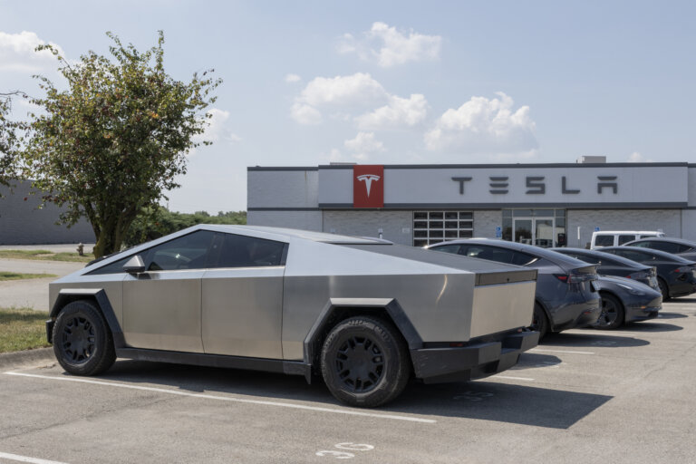 Tesla Cybertruck parked outside Tesla dealership