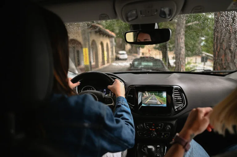 Woman driving with passenger
